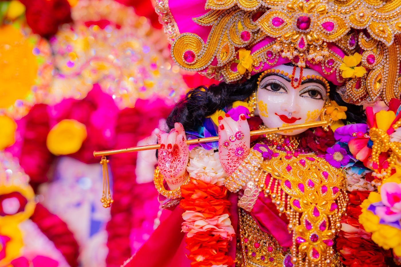 Decorated idol of Lord Krishna with a flute for Krishna Janmashtami